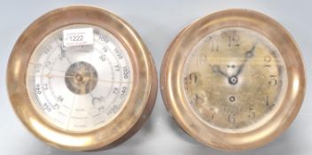 A good vintage 20th Century brass bulkhead clock having a brass face with Arabic numeral chapter