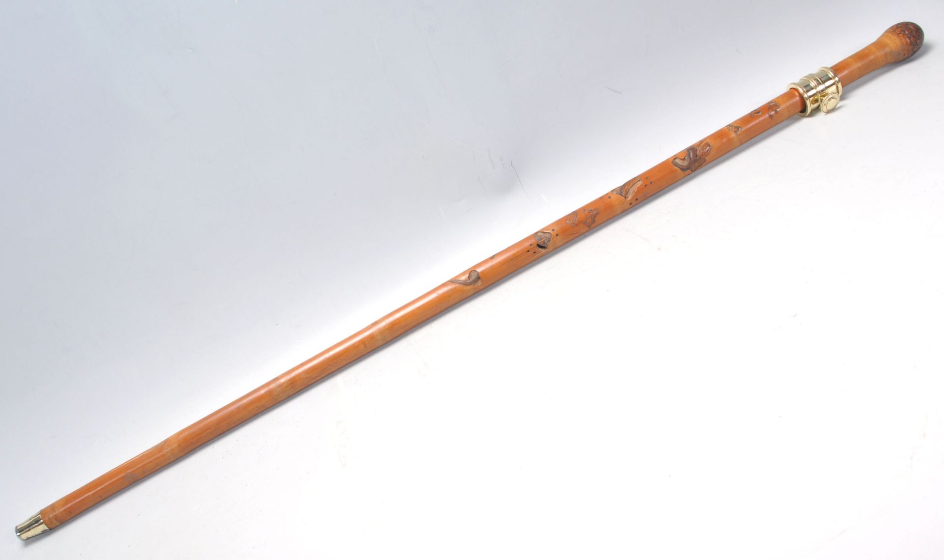 A vintage 20th Century bamboo sword stick / walking stick cane having root knot ball knob to top