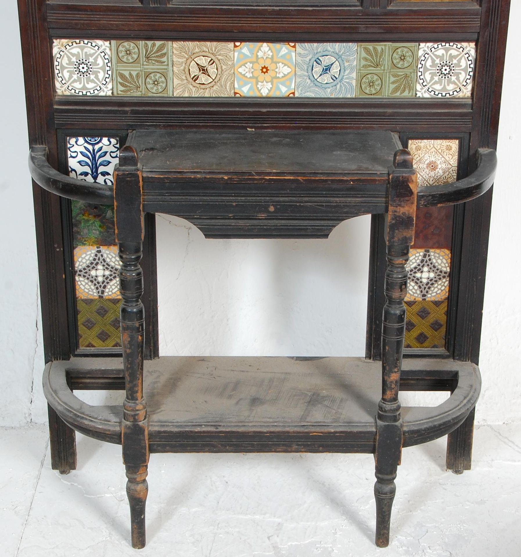 A 19th Century Victorian mahogany framed tiled hall stand with a carved pediment to the top, and a - Bild 2 aus 9