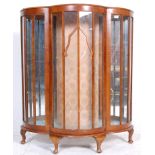 A 1930's Art Deco walnut veneered china display cabinet / vitrine. Raised on cabriole legs with