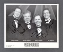 THE OSMONDS - MULTI-SIGNED AUTOGRAPHED PHOTOGRAPH