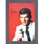 ROGER MOORE - JAMES BOND 007 - SIGNED 8X12" PHOTOG