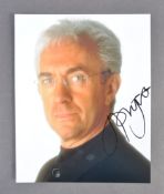 JONATHAN PRYCE - JAMES BOND - SIGNED 8X10" PHOTOGRAPH