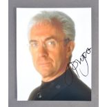 JONATHAN PRYCE - JAMES BOND - SIGNED 8X10" PHOTOGRAPH