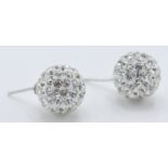 A pair of stamped 925 silver ball earrings being s