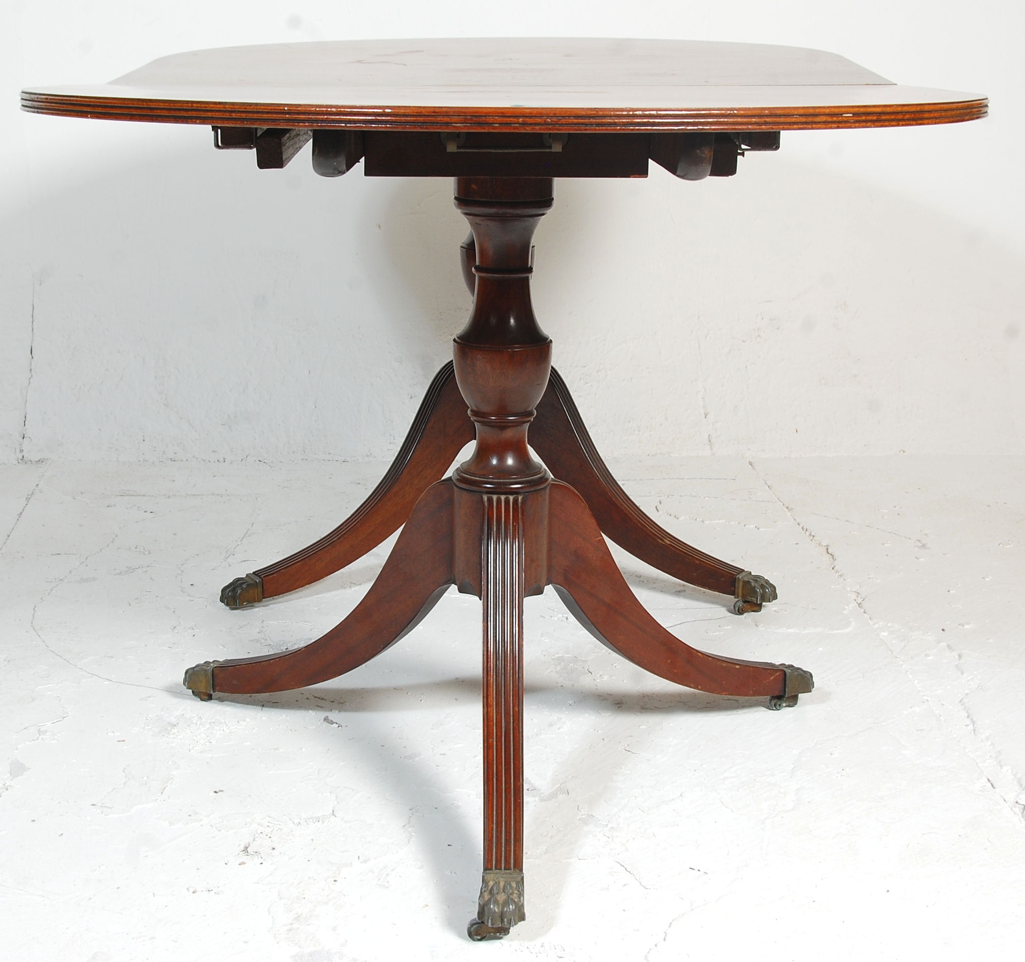 An antique mahogany folding breakfast table having - Image 8 of 8
