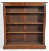 A 19th Century Victorian oak open fronted book cas