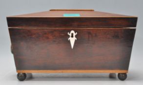 A 19th Century tea caddy of sarcophagus form havin