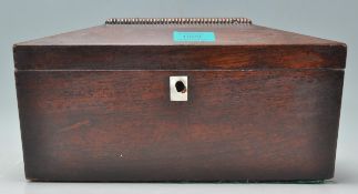 A 19th Century mahogany tea caddy of sarcophagus f