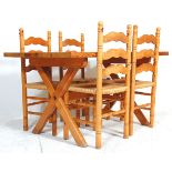 A 20th Century antique country revival pine dining