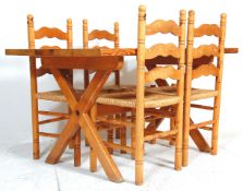 A 20th Century antique country revival pine dining