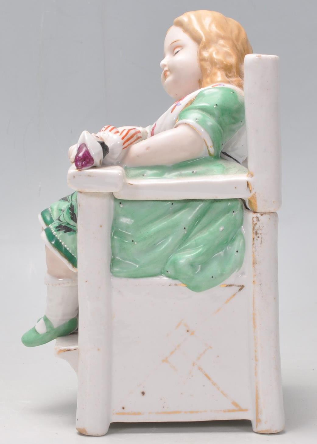 A 19th century continental glazed porcelain figuri - Image 4 of 9