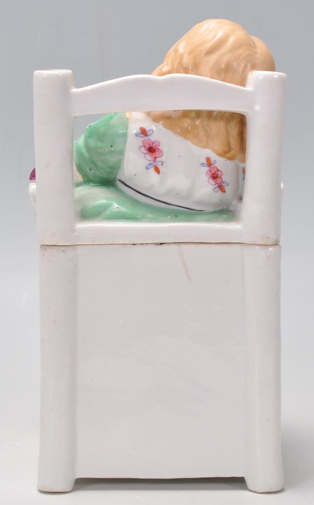 A 19th century continental glazed porcelain figuri - Image 3 of 9