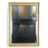 A 20th Century antique style wall mirror of rectan