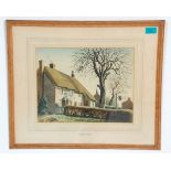 A framed and glazed watercolour painting of a pub