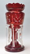 A 19th Century Victorian cranberry glass mantle pi