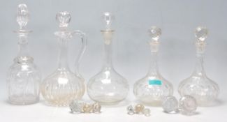 A group of five 20th Century cut glass decanters m