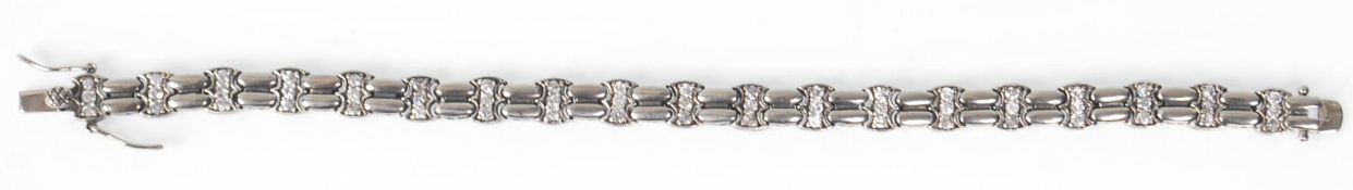 A ladies stamped 925 silver line bracelet being se