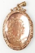 A Victorian 9ct gold back and front ladies oval sh