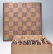 A 20th Century chess set having stylised resin ani