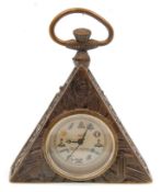 A brass cased Masonic style watch of triangular fo