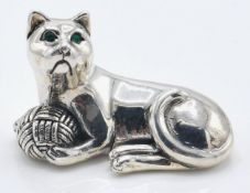 A stamped sterling silver figurine in the form of