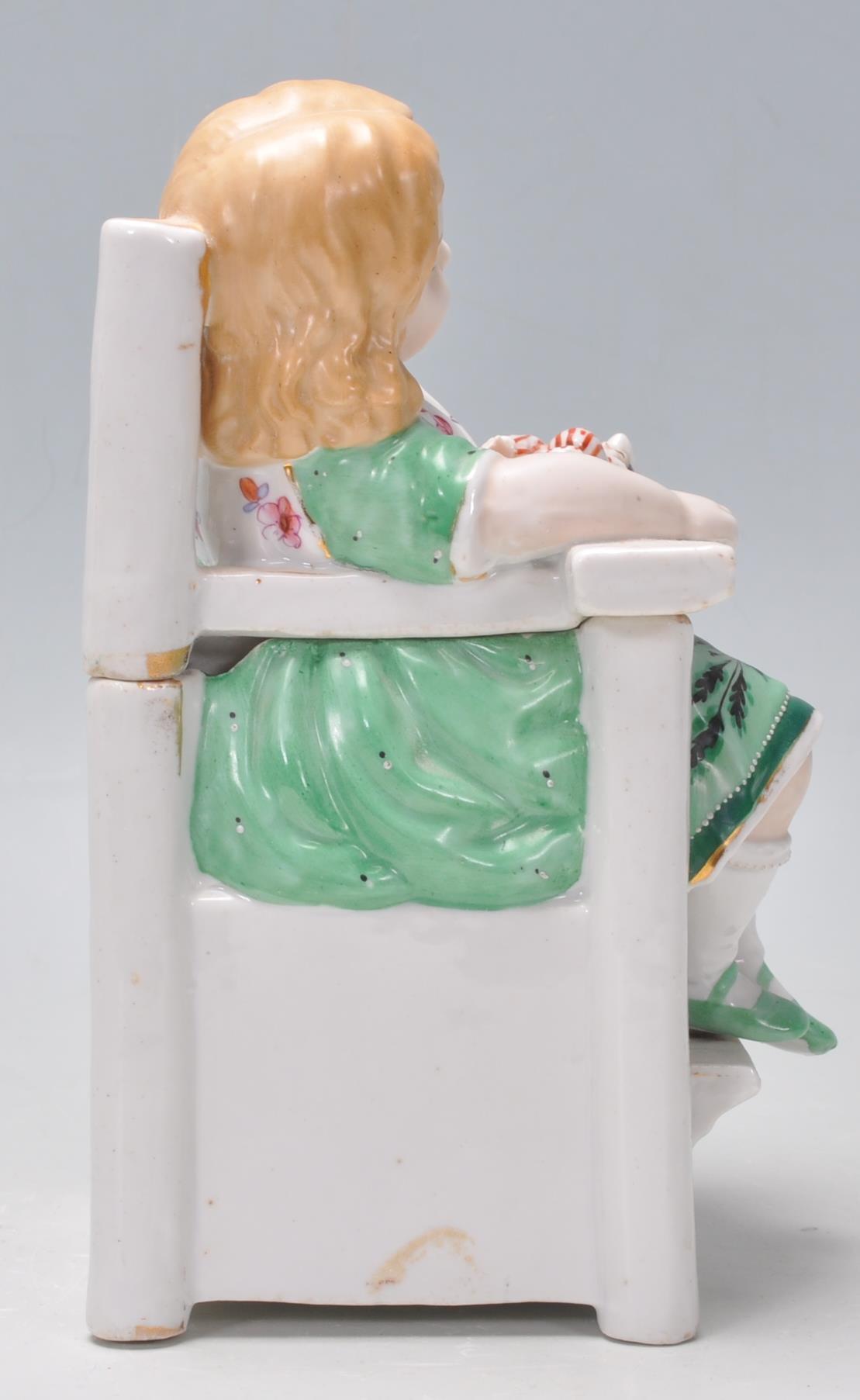 A 19th century continental glazed porcelain figuri - Image 2 of 9