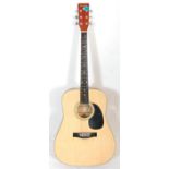 A good Chantry made acoustic guitar having a black