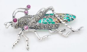 A stamped 925 silver bug brooch in the form of a l