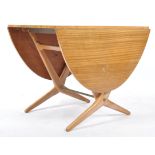 MANNER OF KAI KRISTIANSEN - MID CENTURY TEAK ELEVATOR TABLE