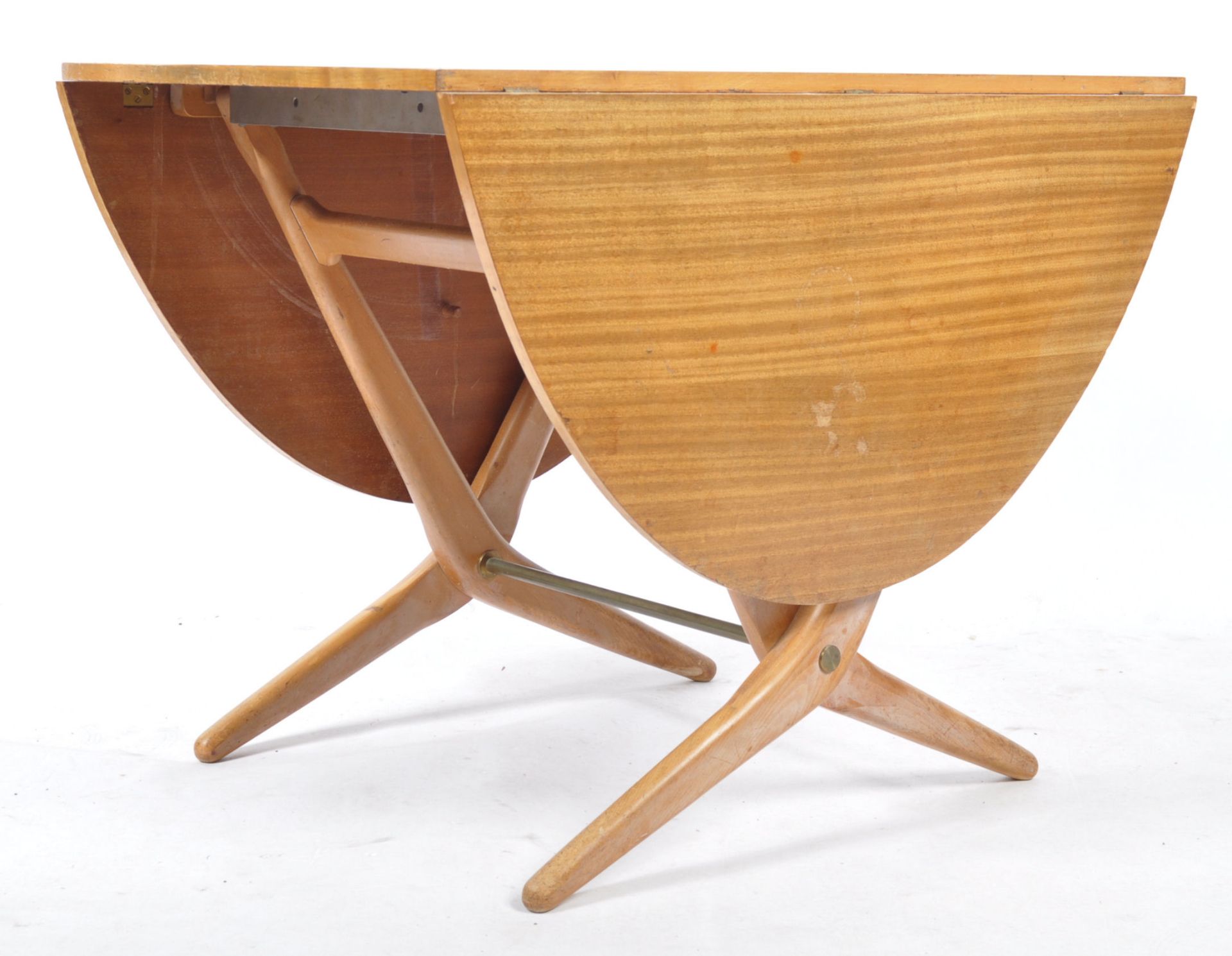 MANNER OF KAI KRISTIANSEN - MID CENTURY TEAK ELEVATOR TABLE