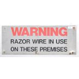 A 20th century retro industrial warning / danger sign on pressed aluminium rectangular plate with