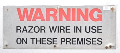 A 20th century retro industrial warning / danger sign on pressed aluminium rectangular plate with