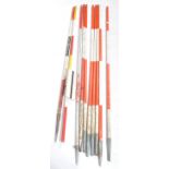 INDUSTRIAL 20TH CENTURY WOODEN SURVEYORS RED AND WHITE POLES