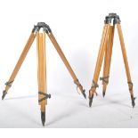 2 RETRO 20TH CENTURY WOODEN AND CAST METAL SURVEYORS TRIPODS