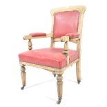MANNER OF GILLOWS OF LANCASTER - OAK & LEATHER LIBRARY ARMCHAIR