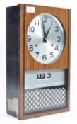 SEIKO CLOCKS - JAPAN. A 1970' 30 DAY TEAK CASED WALL CLOCK