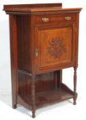 An antique Victorian 19th century mahogany cabinet with single drawer and brass swing handles  above