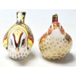A pair of Royal Crown Derby paperweights both in the form of birds including Jenny Wren and both