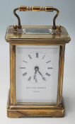 A 20th Century brass carriage clock by Matthew Norman of London having with a roman numeral