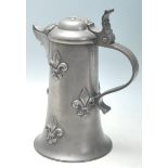 An amazing 19th century large French tankard with hinged lid, parrot beak spout, cylindrical