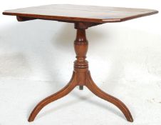A 19th Century George III mahogany tilt top pedestal wine table. Having a rectangular top with