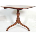 A 19th Century George III mahogany tilt top pedestal wine table. Having a rectangular top with