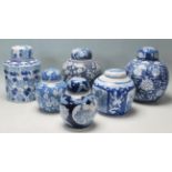 A group of 20th Century Chinese blue and white ginger jars to include three prunus pattern