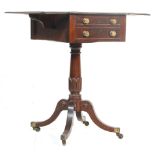 A 19th century George III mahogany drop leaf ladies tripod workbox table. The table raised on a