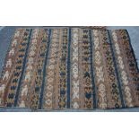 A pair of early 20th Century early south american tribal hand woven carpets / rugs having