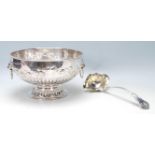 An antique style 20th Century large silver on copper bowl / ice bucket / champagne cooler having