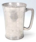 An antique half-gallon pewter tanker in a tapered form with G R 6 makers mark stamped to the top