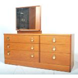 A good retro vintage 20th Century teak wood dressing table with six graduated drawers with brass
