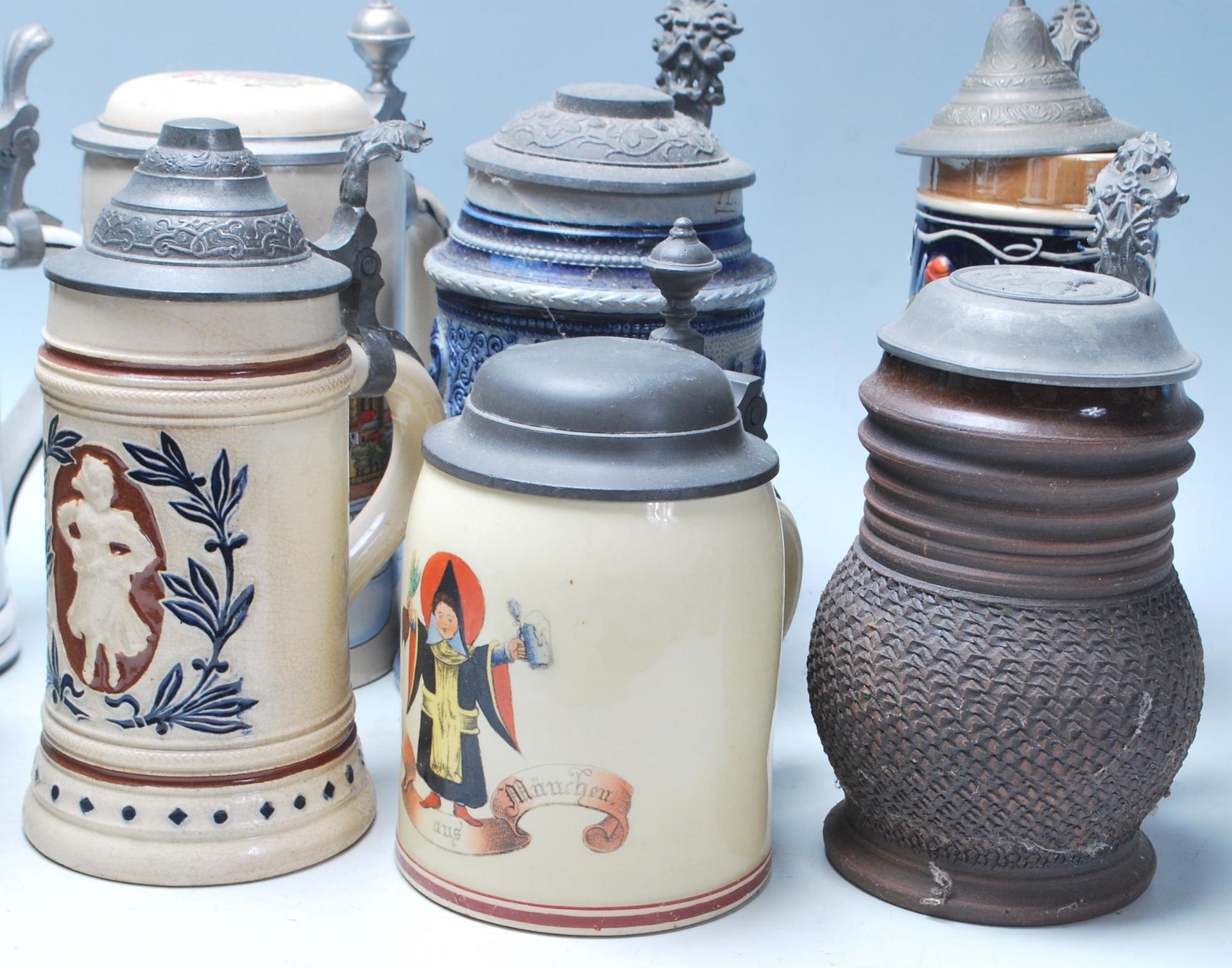 A large collection of German blue and grey stoneware jugs and beer steins, some having pewter - Bild 9 aus 14